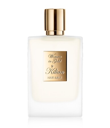Woman in Gold Hair Mist